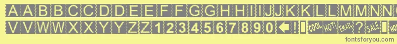 ZackenNormal Font – Gray Fonts on Yellow Background