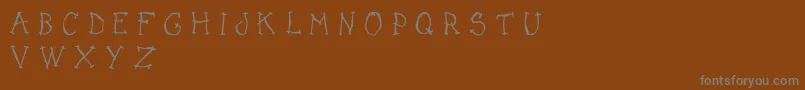 Шрифт DarkPlaceDemo – серые шрифты на коричневом фоне
