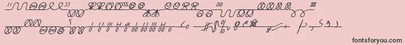 NumukkiI-fontti – mustat fontit vaaleanpunaisella taustalla