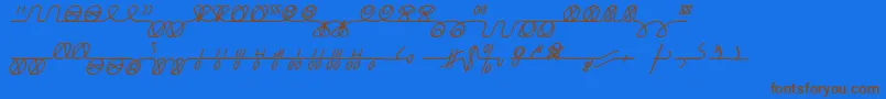 NumukkiI Font – Brown Fonts on Blue Background