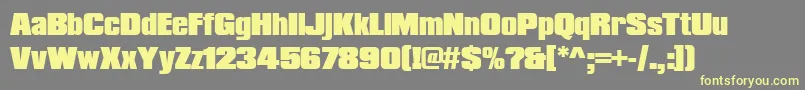 Compactapeebla Font – Yellow Fonts on Gray Background
