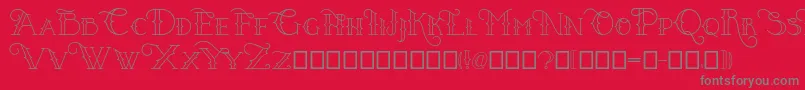 フォントPuertovudu – 赤い背景に灰色の文字