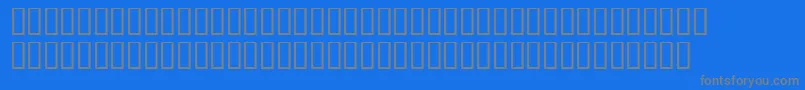 フォントTrainee – 青い背景に灰色の文字