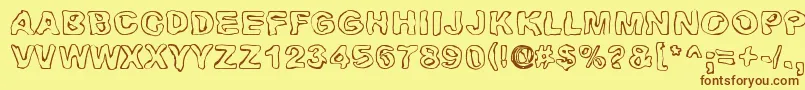 Huhtikuu Font – Brown Fonts on Yellow Background