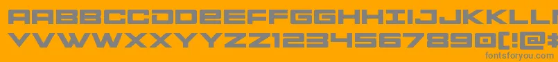 Montrocexpand-fontti – harmaat kirjasimet oranssilla taustalla