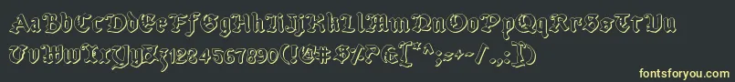 フォントUberv2o – 黒い背景に黄色の文字