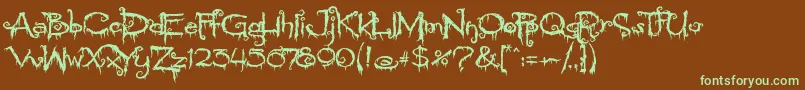 フォントPyriteCrypt – 緑色の文字が茶色の背景にあります。
