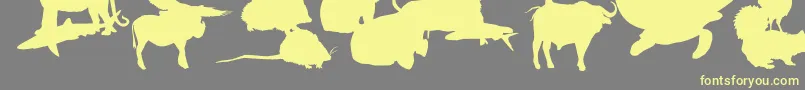 フォントLeMondeDeVictor – 黄色のフォント、灰色の背景