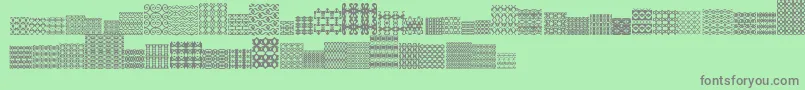 フォントSlTiler2 – 緑の背景に灰色の文字