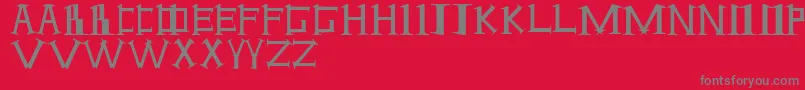 フォントAntioch ffy – 赤い背景に灰色の文字