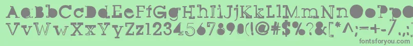 Sqseriftwo-Schriftart – Graue Schriften auf grünem Hintergrund