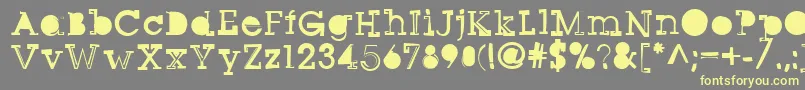 Sqseriftwo-Schriftart – Gelbe Schriften auf grauem Hintergrund