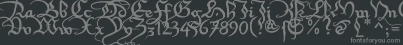Xirwena1-fontti – harmaat kirjasimet mustalla taustalla