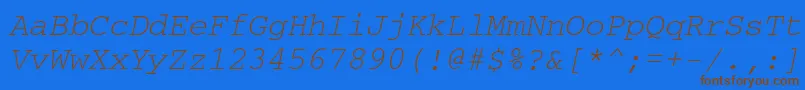 フォントCouriercttItalic – 茶色の文字が青い背景にあります。