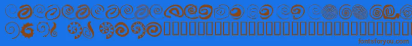 XSpiral Font – Brown Fonts on Blue Background