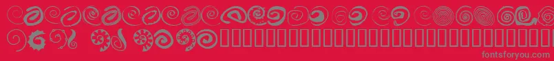 Fonte XSpiral – fontes cinzas em um fundo vermelho