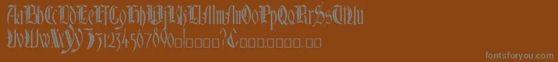 Шрифт Glastonbury – серые шрифты на коричневом фоне