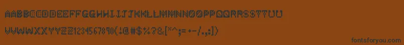 フォントJetpackjoe – 黒い文字が茶色の背景にあります