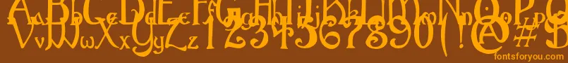 GothicBirthdayCake-Schriftart – Orangefarbene Schriften auf braunem Hintergrund