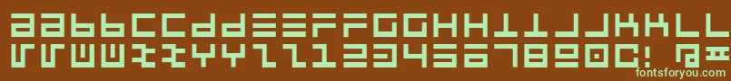 Pclintrulla-fontti – vihreät fontit ruskealla taustalla