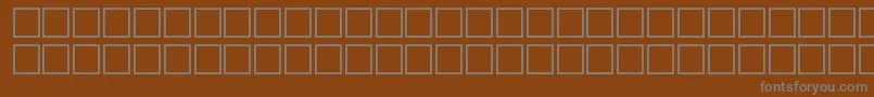 Шрифт Tr – серые шрифты на коричневом фоне