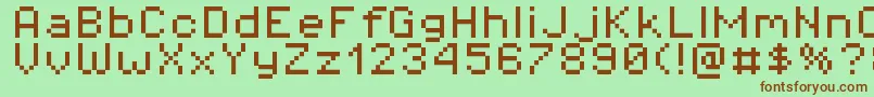 Шрифт Pixeloperator8 – коричневые шрифты на зелёном фоне