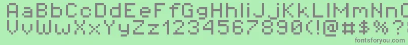 Czcionka Pixeloperator8 – szare czcionki na zielonym tle