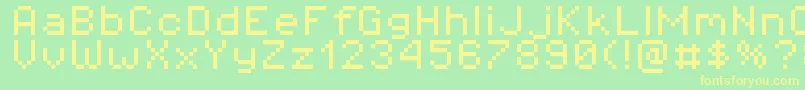 Pixeloperator8-fontti – keltaiset fontit vihreällä taustalla