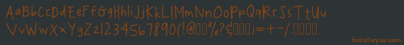 Czcionka SpookydeeeHandwritingRegular – brązowe czcionki na czarnym tle