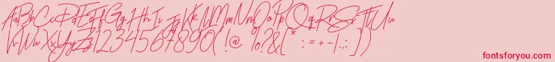 フォントRhesmanisa – ピンクの背景に赤い文字