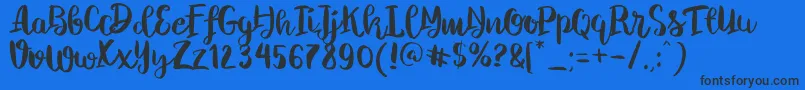 ChelseaBrushScript Font – Black Fonts on Blue Background