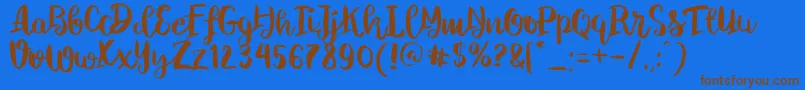 ChelseaBrushScript Font – Brown Fonts on Blue Background