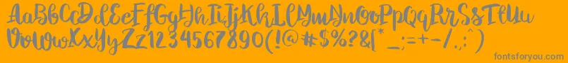 ChelseaBrushScript Font – Gray Fonts on Orange Background