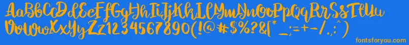 ChelseaBrushScript Font – Orange Fonts on Blue Background