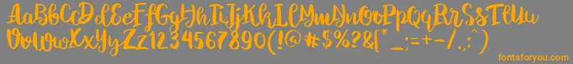 ChelseaBrushScript Font – Orange Fonts on Gray Background
