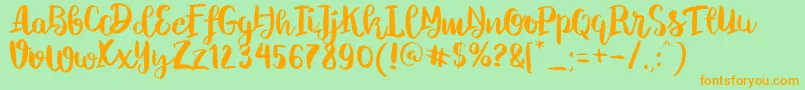 ChelseaBrushScript Font – Orange Fonts on Green Background