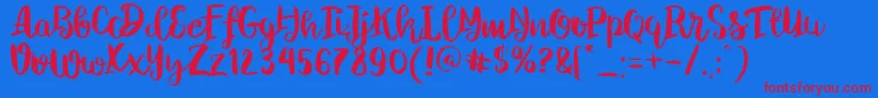 フォントChelseaBrushScript – 赤い文字の青い背景