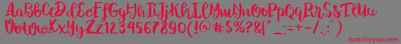 フォントChelseaBrushScript – 赤い文字の灰色の背景
