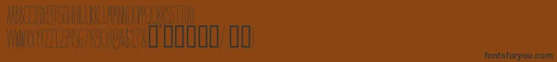 IntoTheVortex Font – Black Fonts on Brown Background