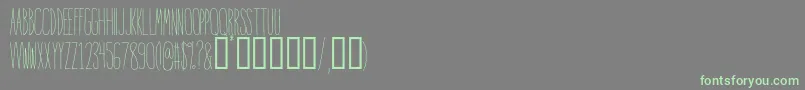 IntoTheVortex-Schriftart – Grüne Schriften auf grauem Hintergrund
