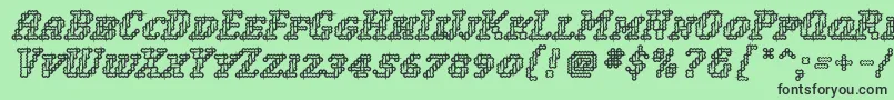 WoollyInline Font – Black Fonts on Green Background
