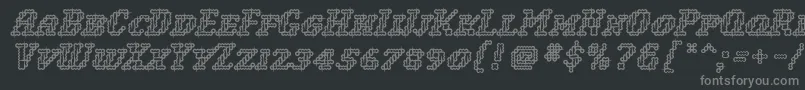 Шрифт WoollyInline – серые шрифты на чёрном фоне