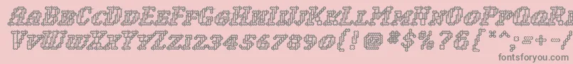 More about WoollyInline Font WoollyInline Font – Gray Fonts on Pink Background