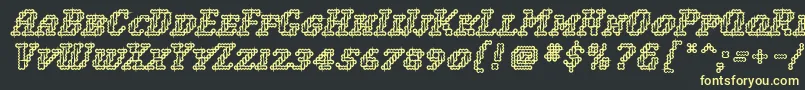 WoollyInline Font – Yellow Fonts on Black Background