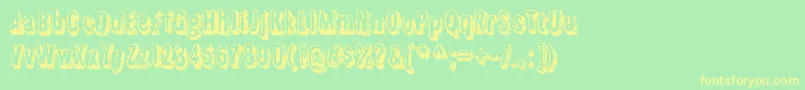 FlyswimRegular-fontti – keltaiset fontit vihreällä taustalla