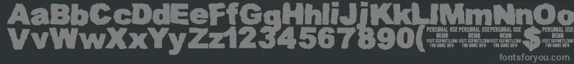 MuddytractordemoKcfonts Font – Gray Fonts on Black Background