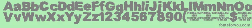 MuddytractordemoKcfonts Font – Gray Fonts on Green Background