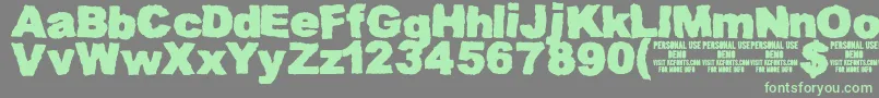 MuddytractordemoKcfonts Font – Green Fonts on Gray Background