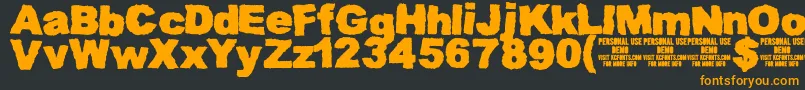 MuddytractordemoKcfonts Font – Orange Fonts on Black Background