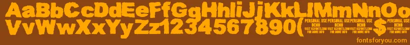 MuddytractordemoKcfonts Font – Orange Fonts on Brown Background